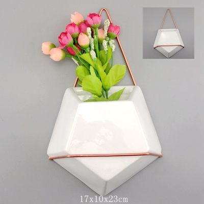 cream ceramic plant pots with metal wire