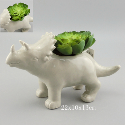 gold dinosaur planter