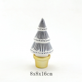 White christmas tree with blue lines and gold base