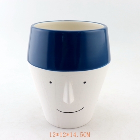 White And Blue Ceramic Face Planter